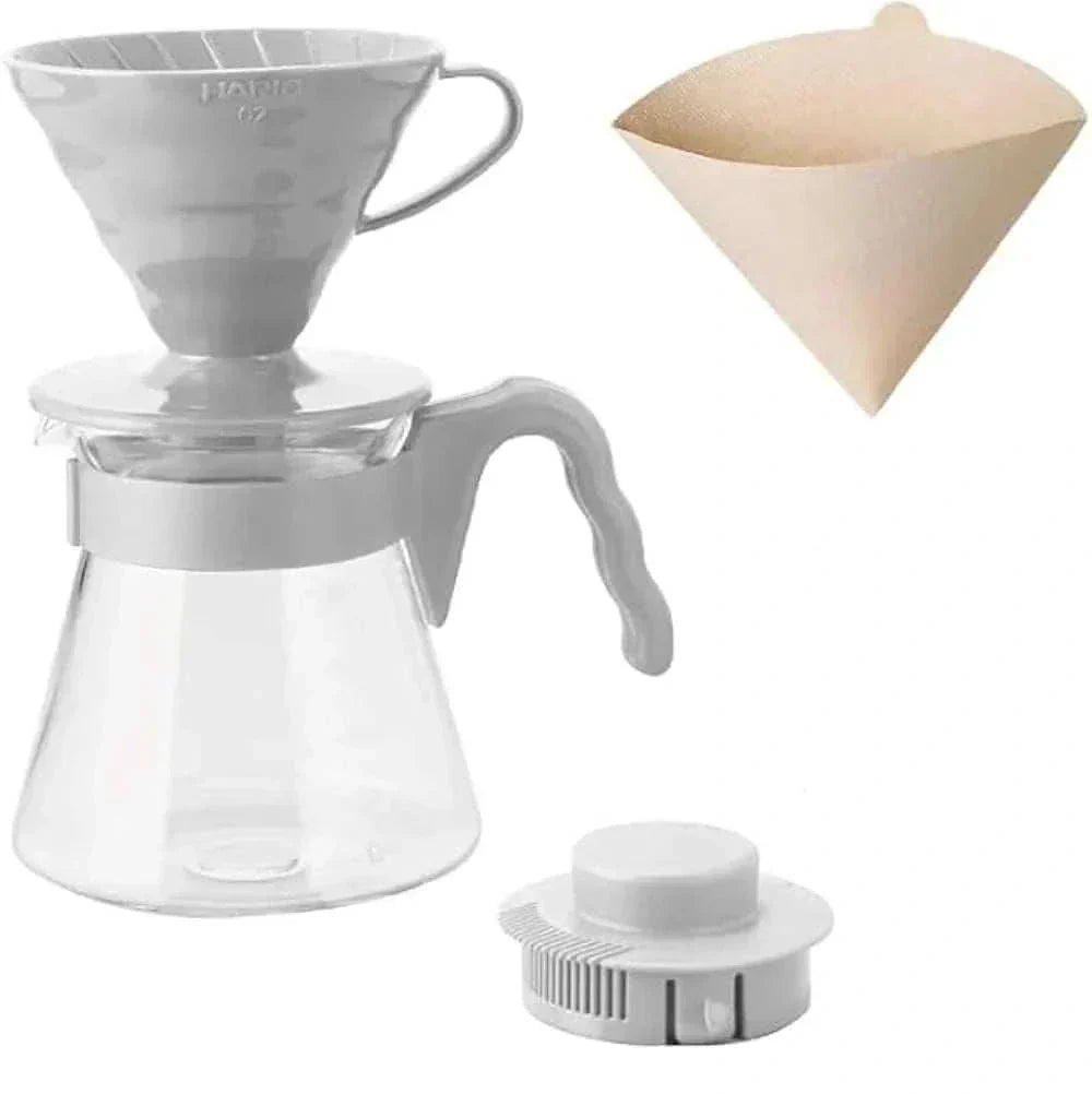 Gray plastic V60 coffee dripper set with paper filter and server.