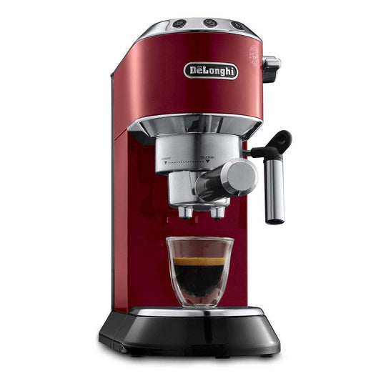 Compact red Delonghi Dedica espresso machine on kitchen counter.